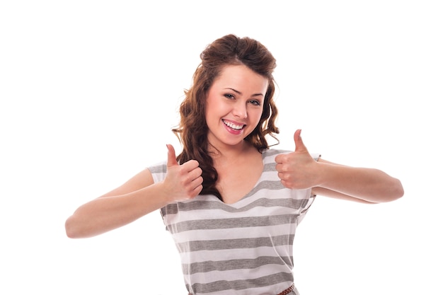 Free Photo portrait of happy woman with thumbs up
