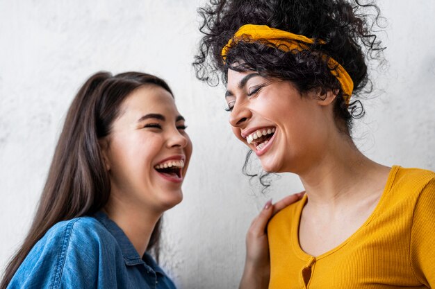 Portrait of happy women laughing