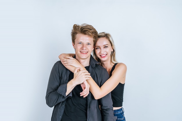 Portrait of happy young couple love together with flower 