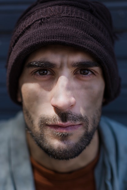 Free photo portrait of homeless man with beautiful eyes