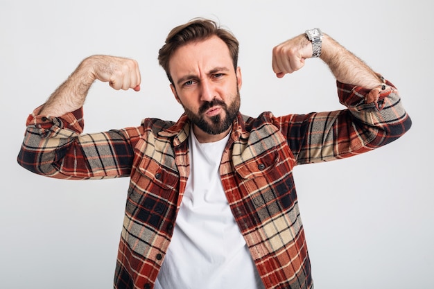 Portrait of isolated handsome brutal argressive strong bearded man