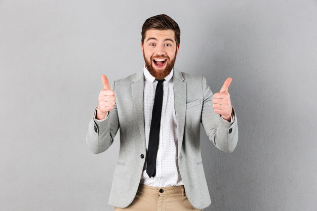 Portrait of a joyful businessman dressed in suit