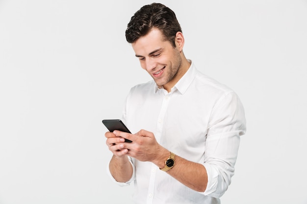 Portrait of a joyful smiling man in white shirt