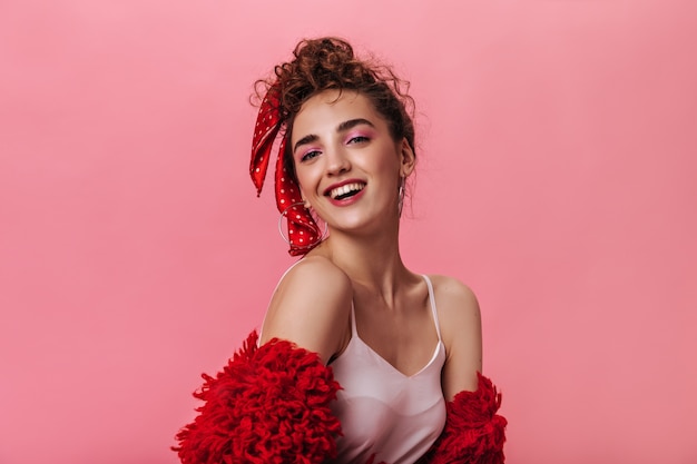 Portrait of lady in red coat looking into camera