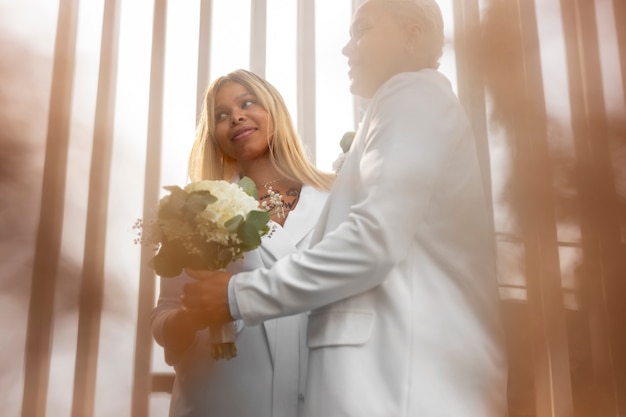 Free photo portrait of lesbian women during their wedding ceremony