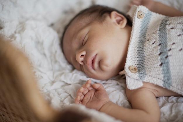 Free photo portrait of little baby sleeping