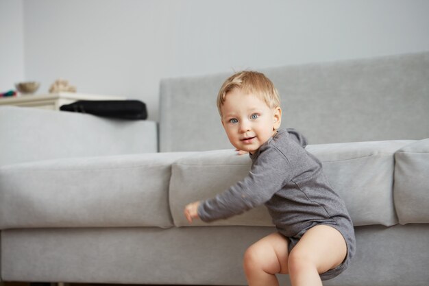 Portrait of little boy at home