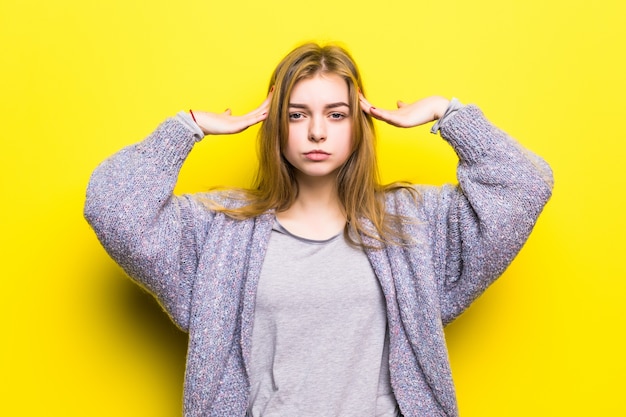 Free Photo portrait of a lovely teenage girl thinkinh isolated