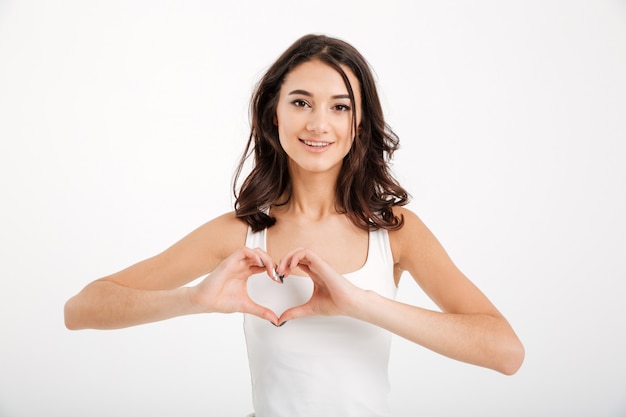 Portrait of a lovely woman dressed in tank-top