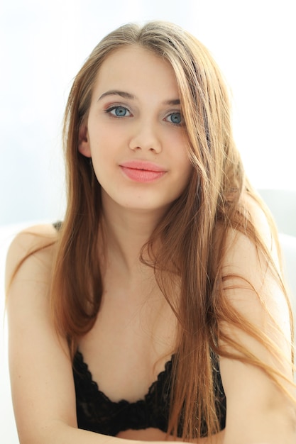 Portrait of lovely young woman in underwear