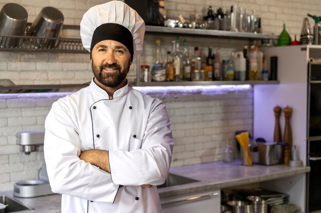 Portrait of male chef in the kitchen