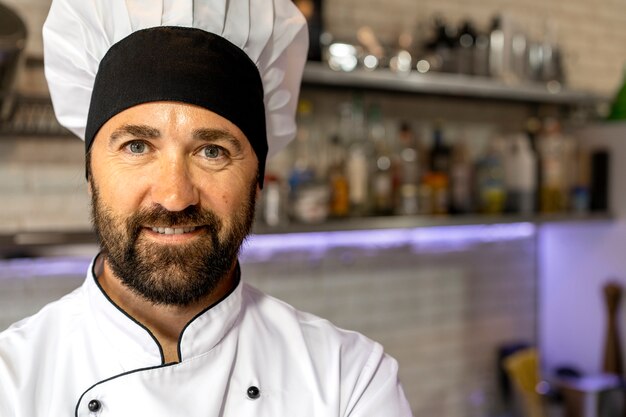 Portrait of male chef in the kitchen