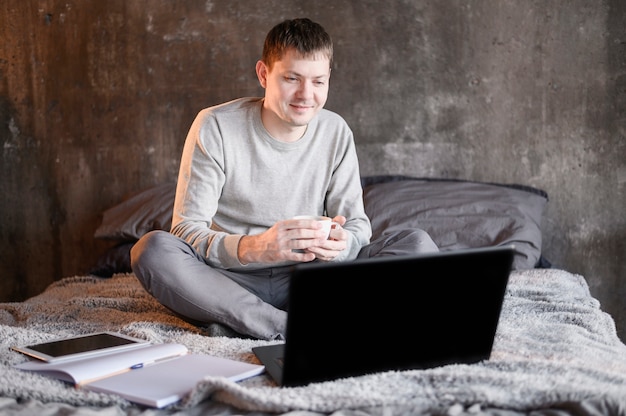 Portrait of man enjoying remote work