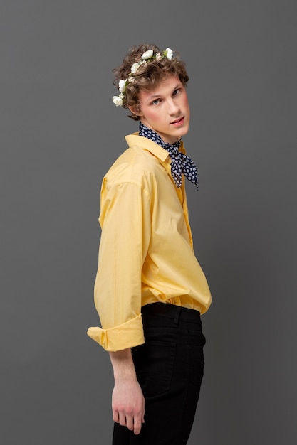 Free Photo portrait man in fashionable shirt wearing floral wreath