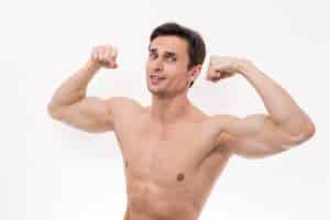 Free photo portrait of man flexing arms