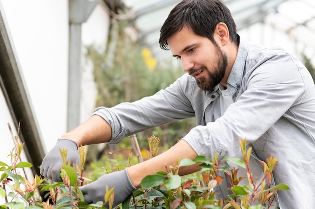 Portrait man growing plants