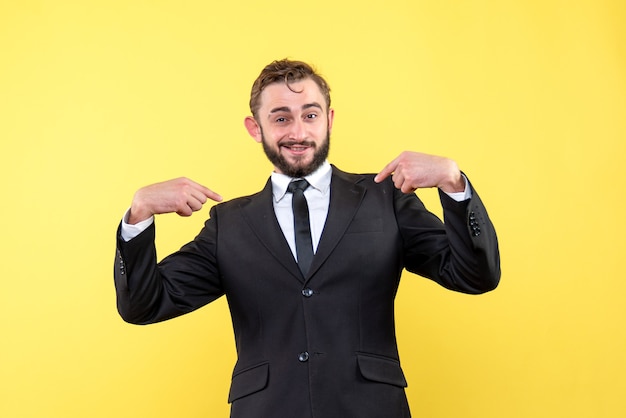 Portrait of a man proud of himself on yellow isolated