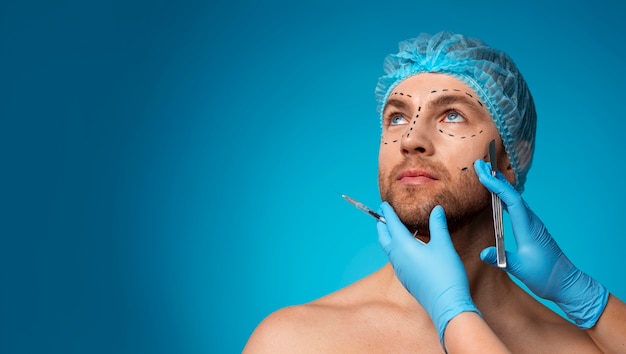 Free photo portrait of man receiving enhancements and tweakments through the help of cosmetic procedures