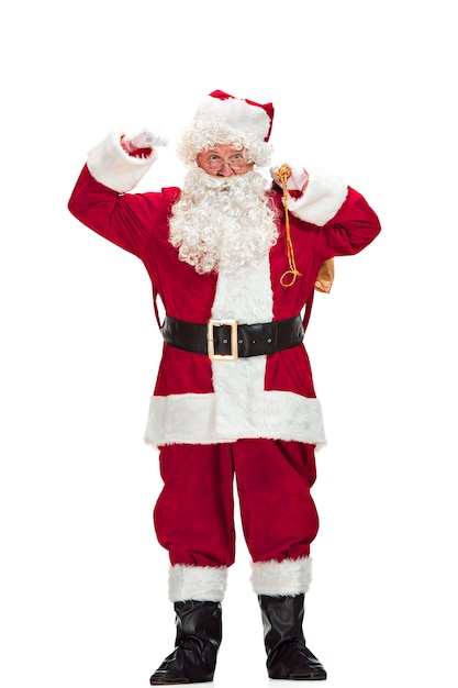 Free Photo portrait of man in santa claus costume with a luxurious white beard, santa's hat and a red costume - in full length isolated on white