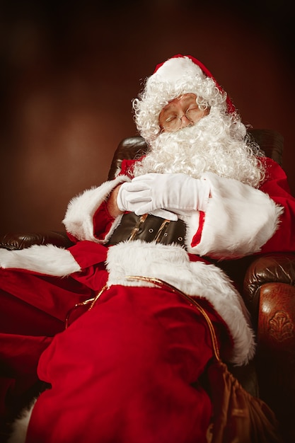 Free Photo portrait of man in santa claus costume