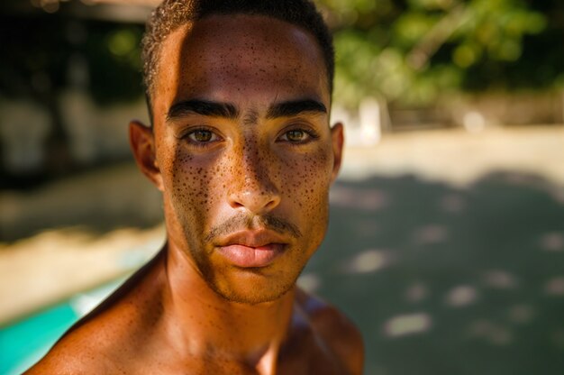 Portrait of man with beauty marks and freckles