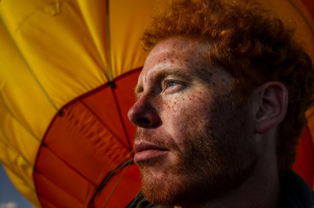 Free Photo portrait of man with freckles and beauty marks