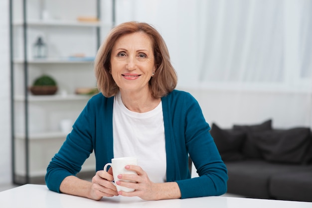 Free Photo portrait of mature woman smiling