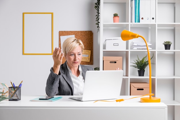 Portrait of middle aged businesswoman in office