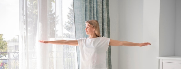 Free Photo portrait mom stretching arms