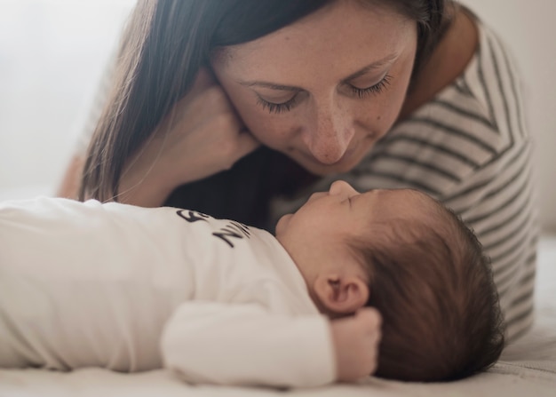 Free Photo portrait of mother watching her son