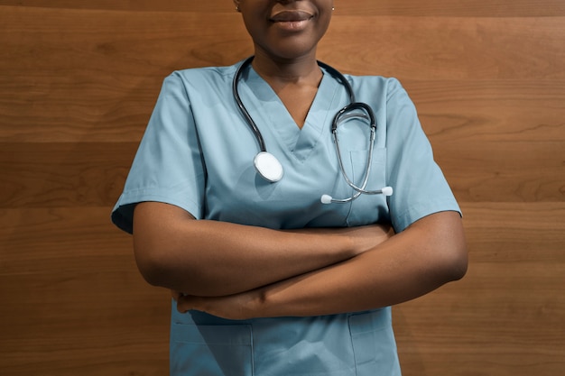 Portrait of nurse in scrubs at the clinic