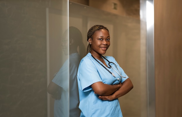 Portrait of nurse in scrubs at the clinic