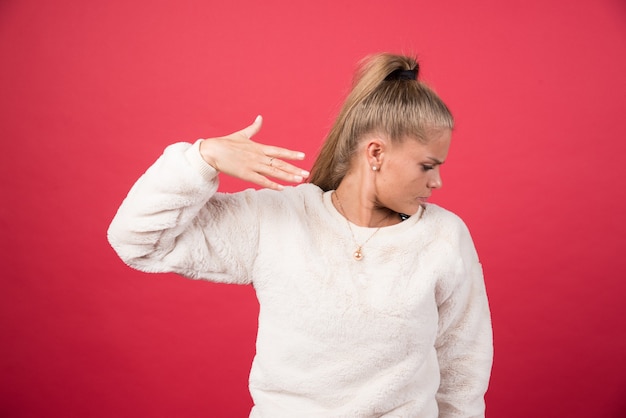 Portrait of an offended woman turning head away