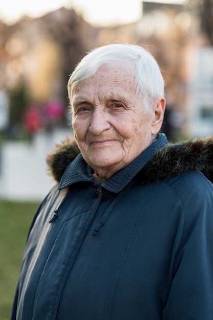 Portrait of older woman in the city