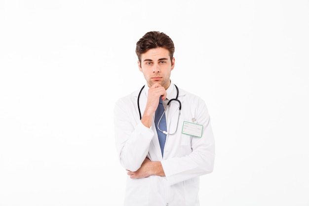 Portrait of a pensive young male doctor