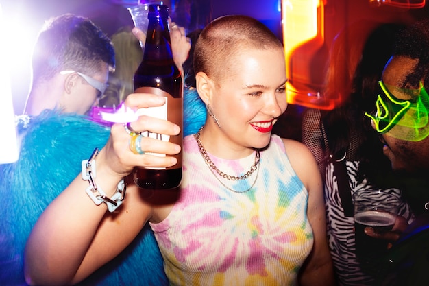 Portrait of person attending a vibrant techno music party