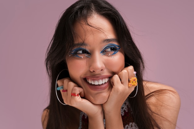 Portrait of person wearing graphic eye makeup