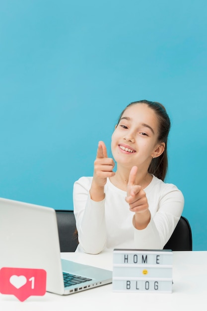 Portrait of positive young girl smiling