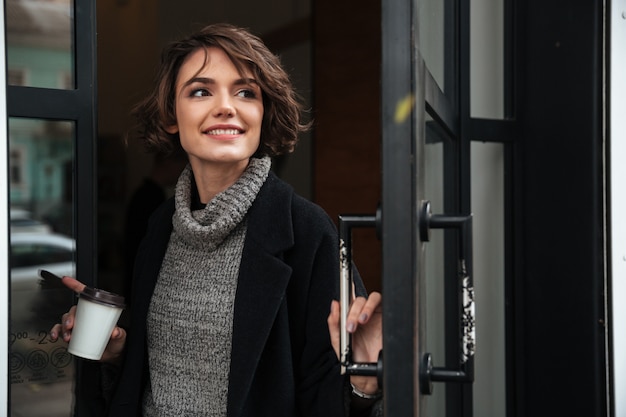 Portrait of a pretty girl dressed in autumn clothes