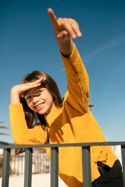 Free Photo portrait of pretty little girl having fun