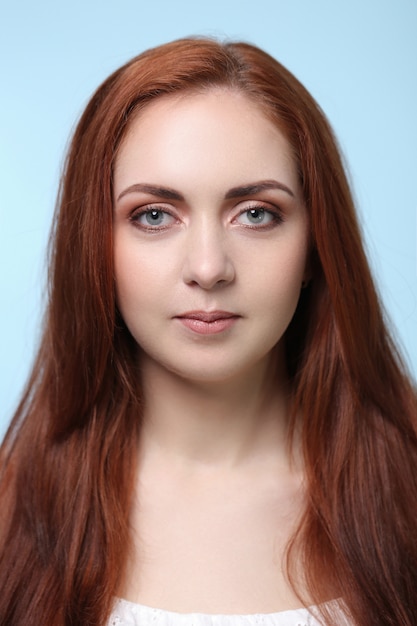 Portrait of pretty redhead woman