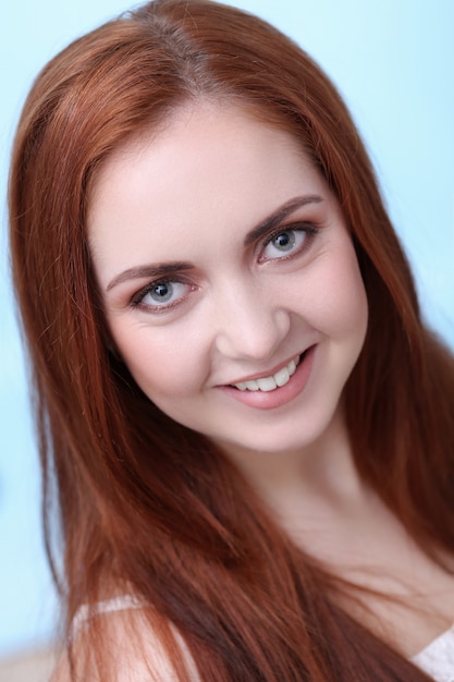 Portrait of pretty redhead woman