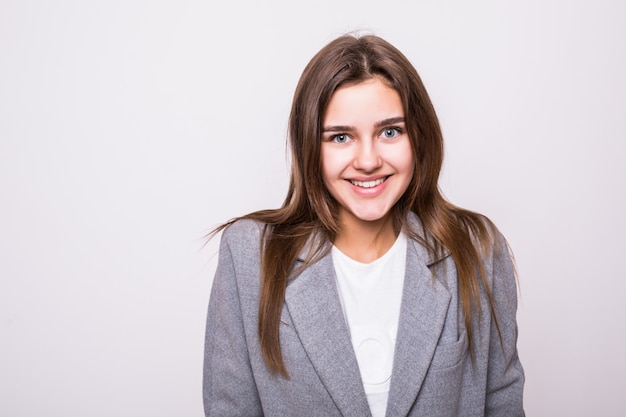 Portrait of a pretty smiling woman posing on a white background