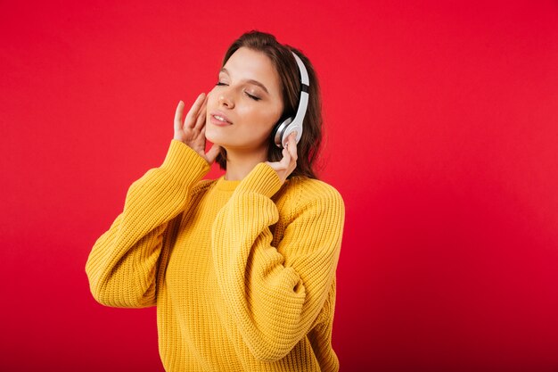 Portrait of a pretty woman in headphones