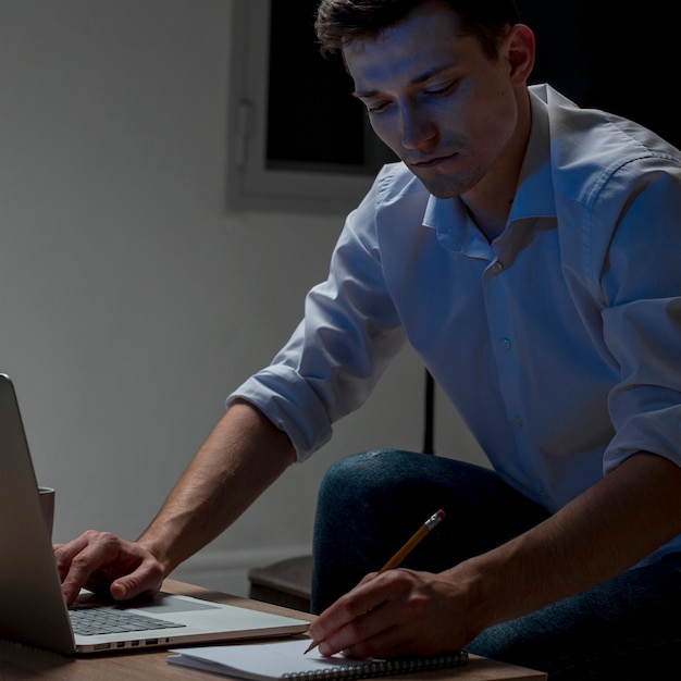 Portrait of professional working from home at night