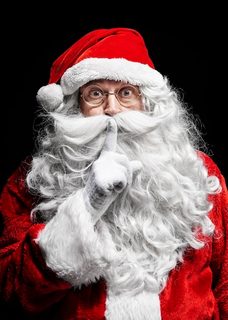 Portrait of santa claus gesturing at studio shot