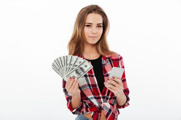 Portrait of a satisfied smiling girl in plaid shirt