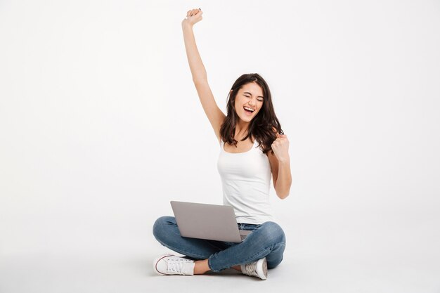 Portrait of a satisfied woman dressed in tank-top