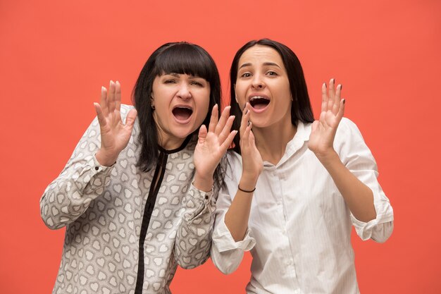 A portrait of a scared mother and daughter at studio on coral