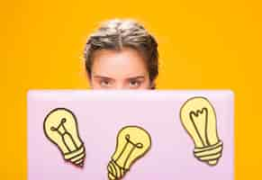 Free photo portrait of schoolgirl studying with laptop